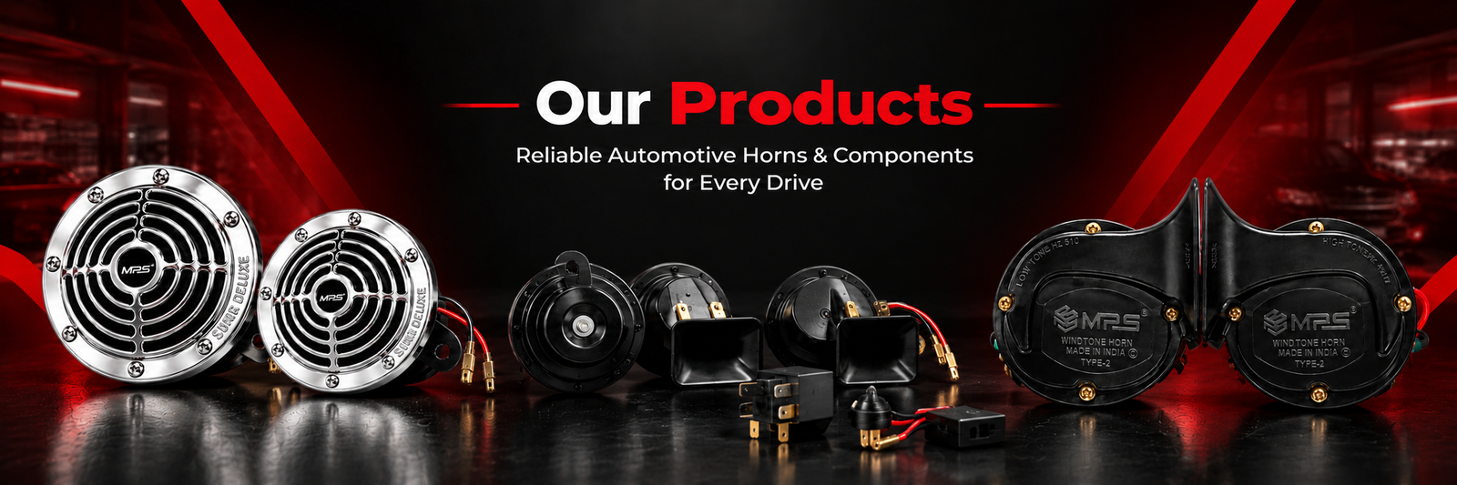 MPS automotive horns and electrical components displayed in a premium dark industrial setting